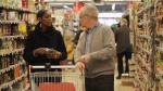 Alain and Dafroza Gauthier in their local supermarket